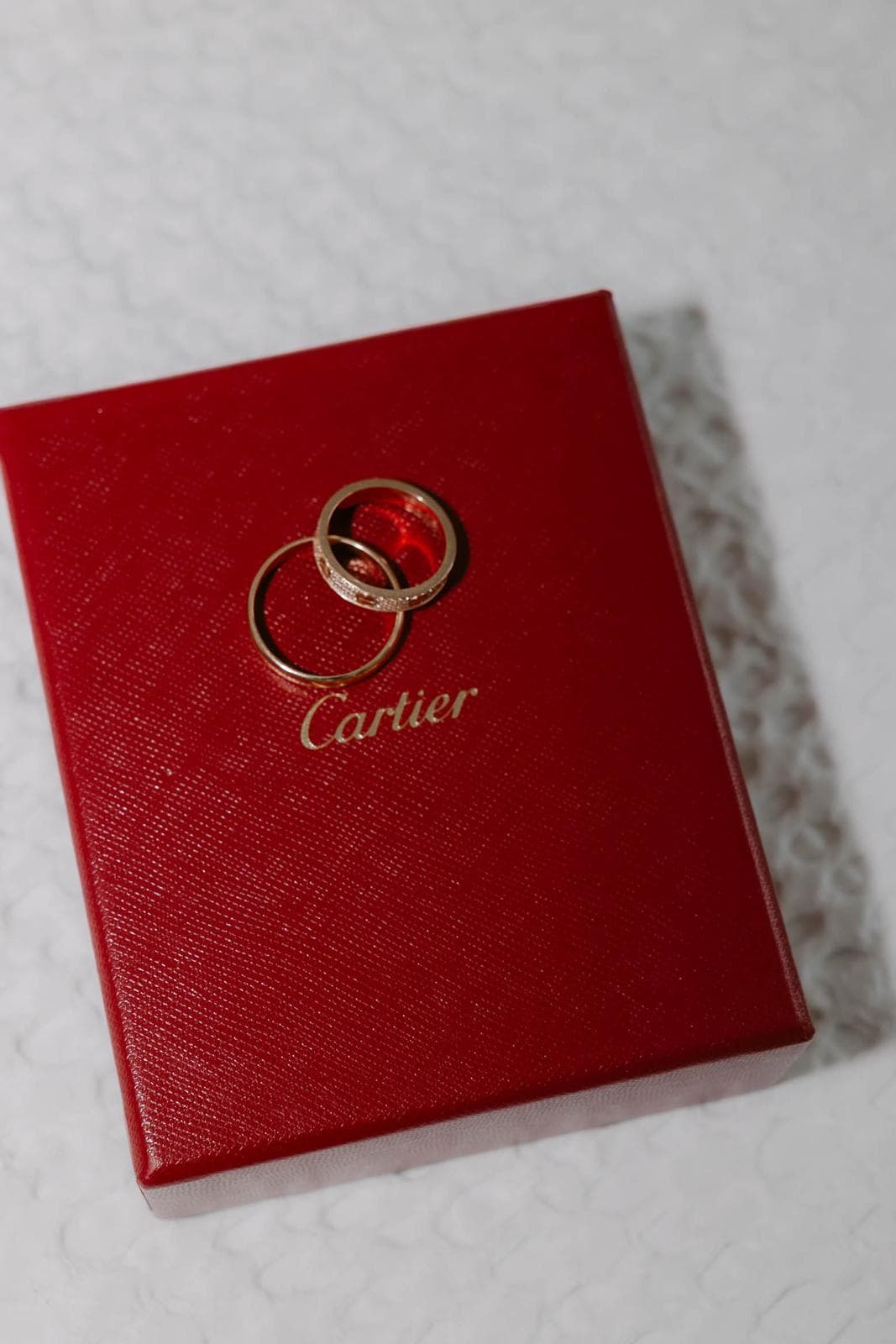 Cartier wedding rings in luxury presentation