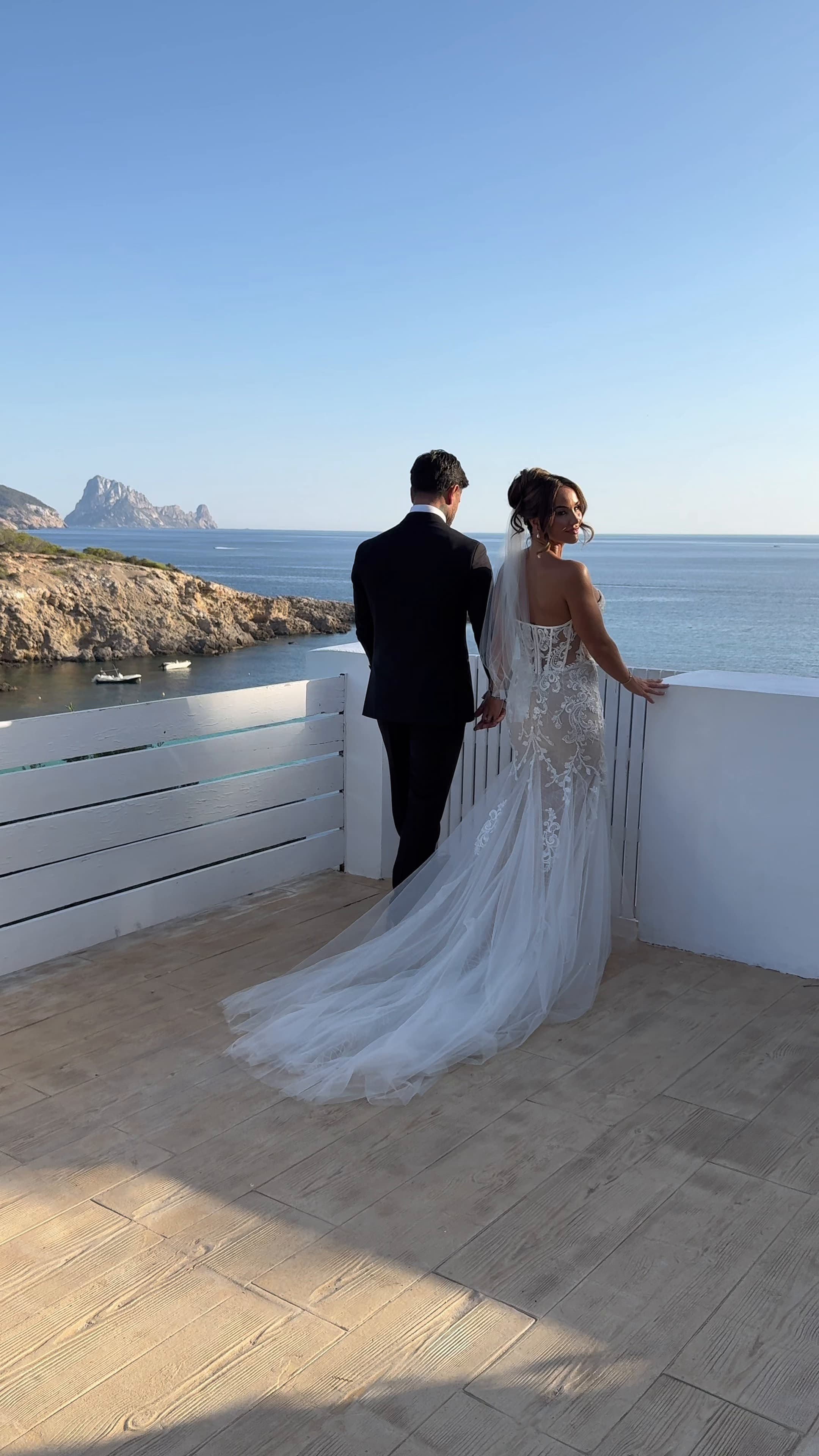 Wedding couple overlooking Es Vedrà, Ibiza